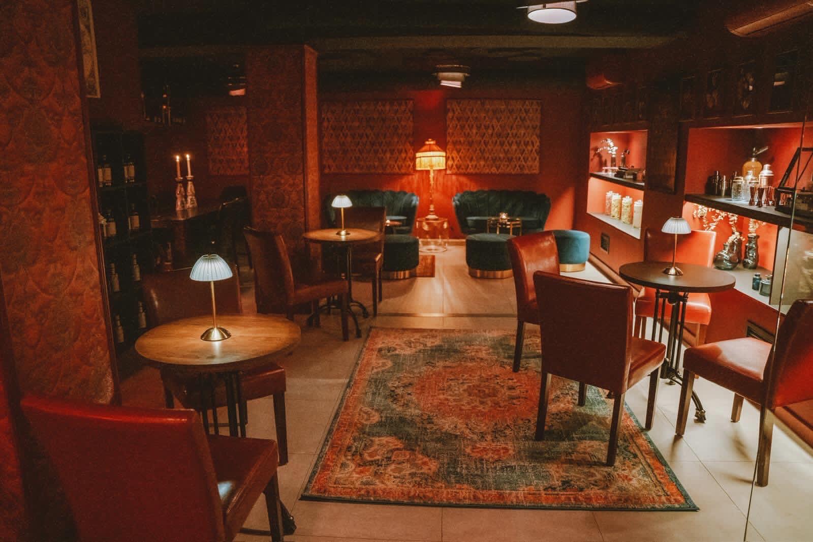 Intimate room of The Pharmacy Speakeasy on the underground floor